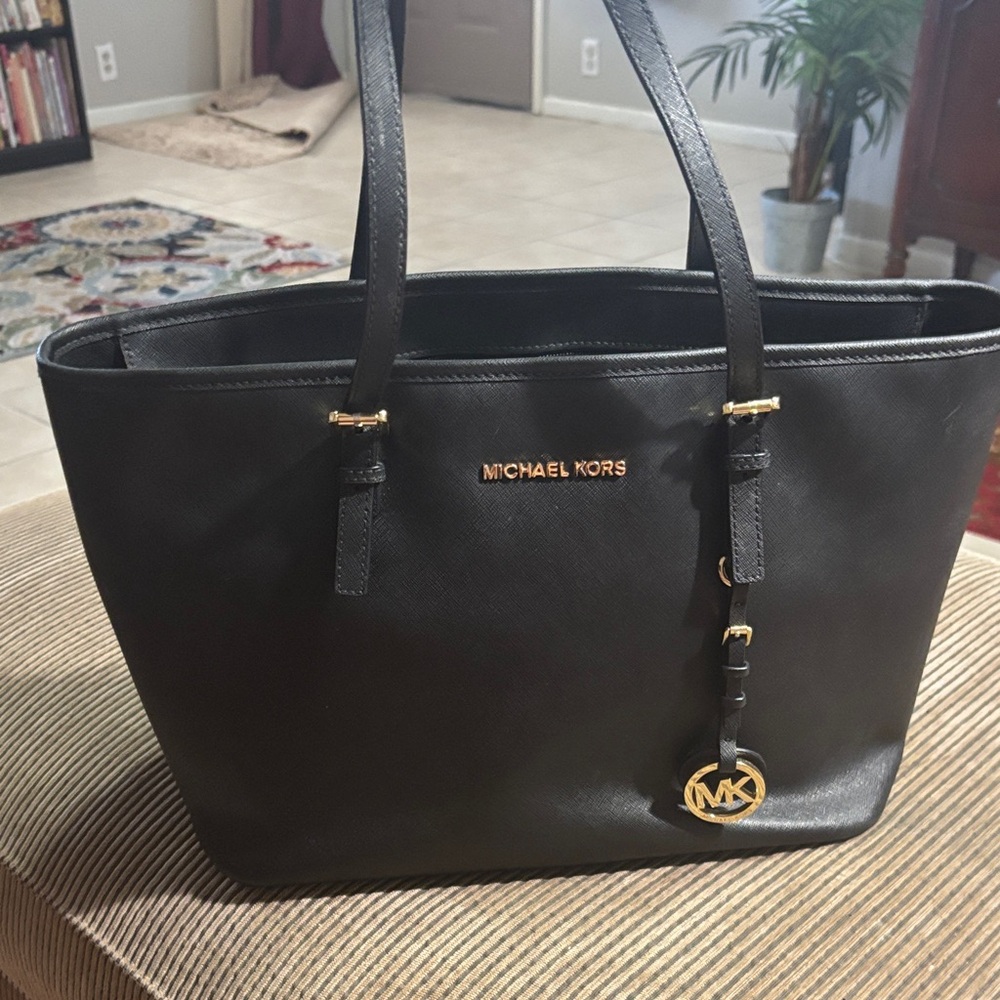 Michael Kors Elegant Black Tote with Gold Accents